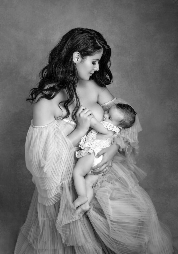 Mother and baby girl portrait in black and white.